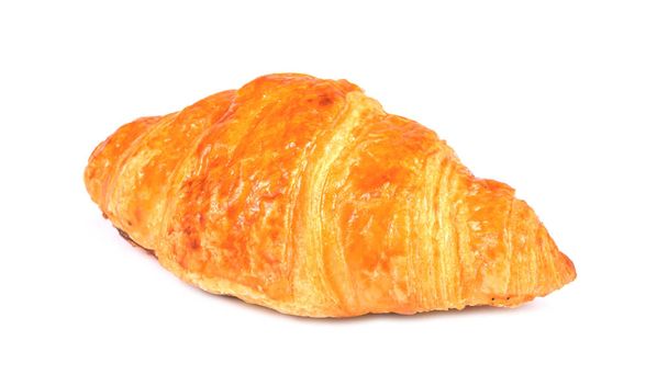 Valkoista taustaa vasten juuri leivottu croissant
 - Valokuva, kuva