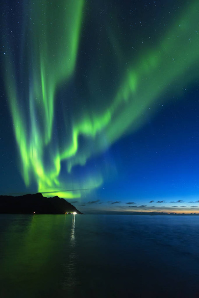 Aurora Borealis, North lights at Tungeneset beach, Ersfjord, Senja, Norway - Фото, зображення