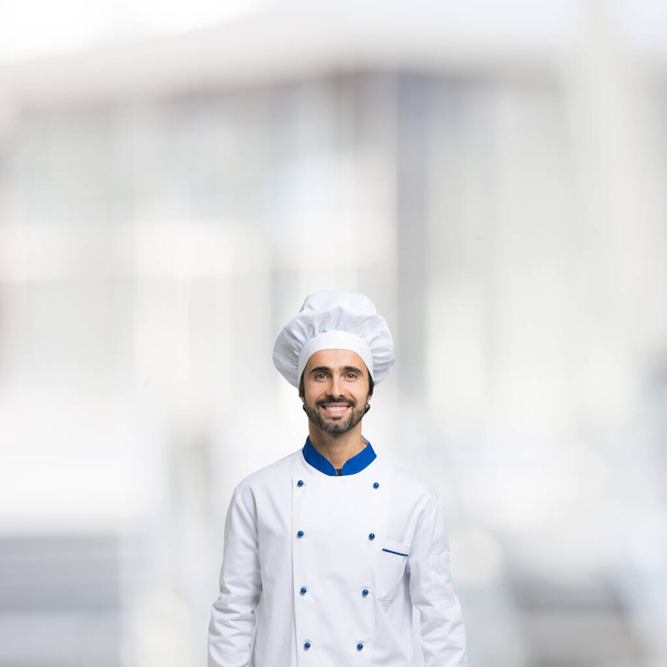 Chef smiling on large copyspace - Foto, imagen