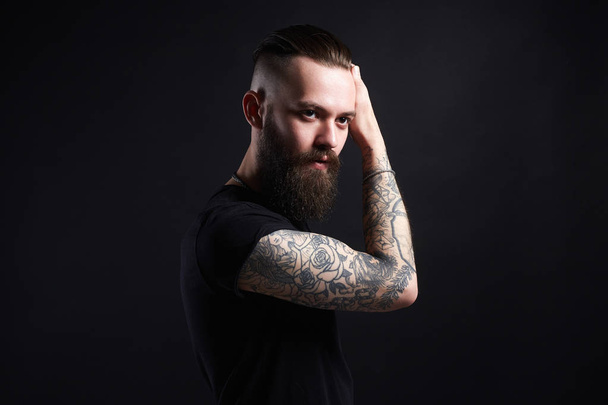 Boy with stylish haircut and tattoo. handsome Man - Photo, Image