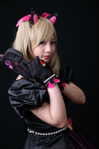 Japan anime cosplay, portret van meisje cosplay geïsoleerd in zwart - Foto, afbeelding