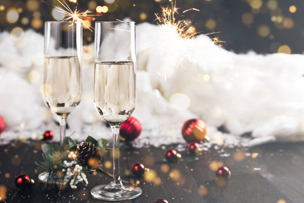 Christmas and New Year celebration with glasses of champagne - Photo, image