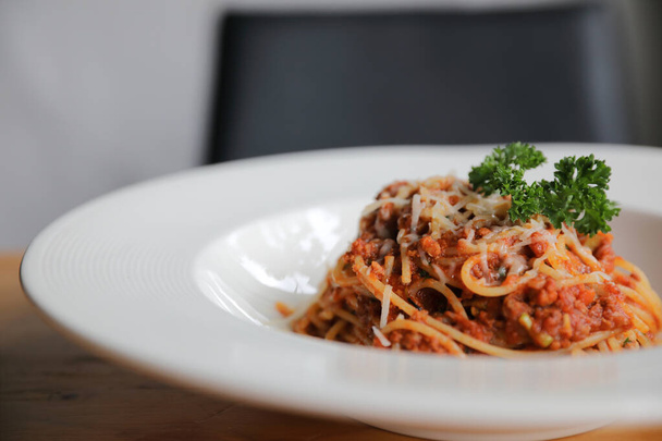 spaghetti Bolognese with minced beef and tomato sauce garnished  - Fotoğraf, Görsel