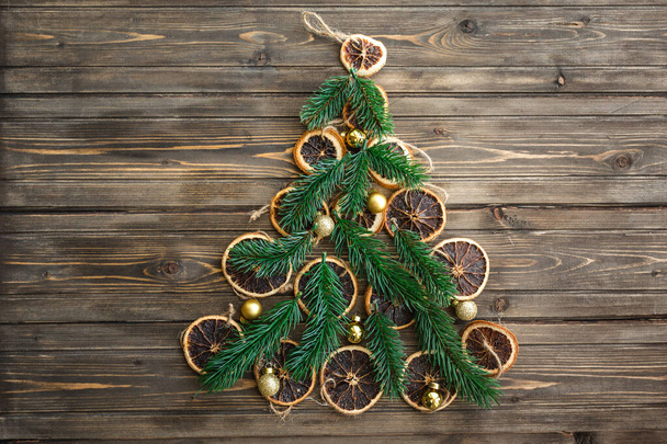 Brown wooden background with Christmas decoration - Foto, Imagen