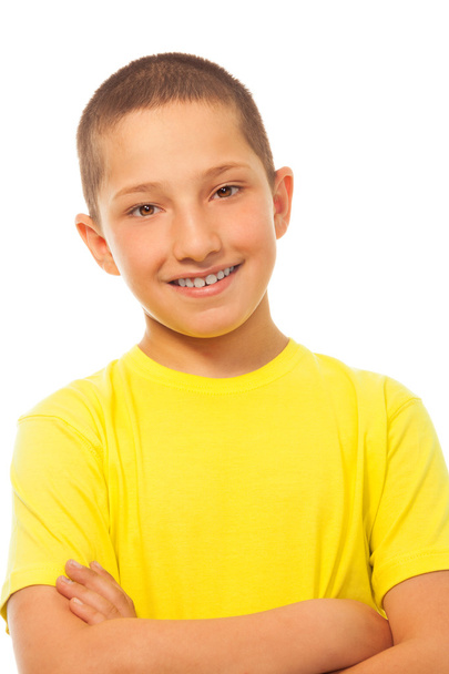 Happy smiling boy in yellow shirt - Fotó, kép