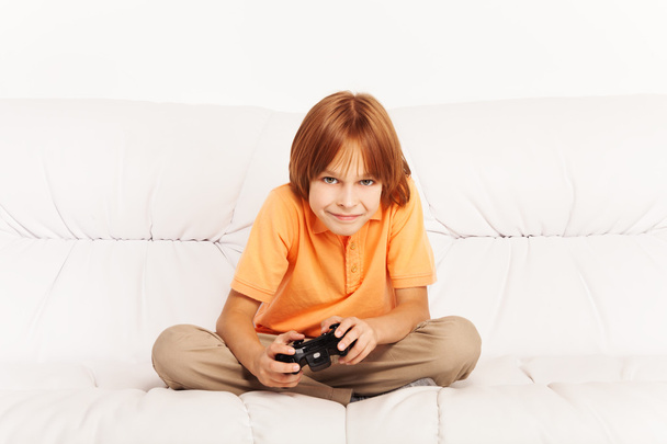 Boy playing video game - Photo, Image