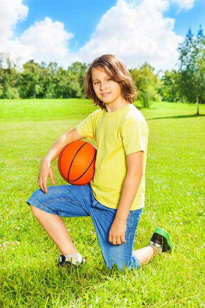 Boy with basketball posing - Фото, изображение