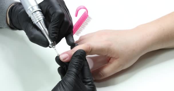 Procedure of hardware manicure in a beauty salon for women - Footage, Video