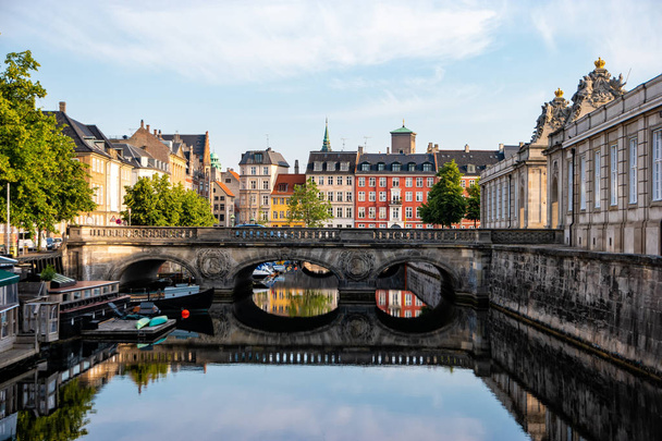 Copenhagen, Denmark. View of old Marmorbroen or Marble bridge with the reflection. The historical center of the Danish capital. - Fotoğraf, Görsel