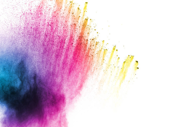 Abstract multicolored dust splash on white background. Bizarre form of color powder explosion on white background. - Photo, Image