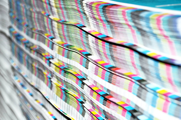 Stack of paper with CMYK scale - Photo, Image