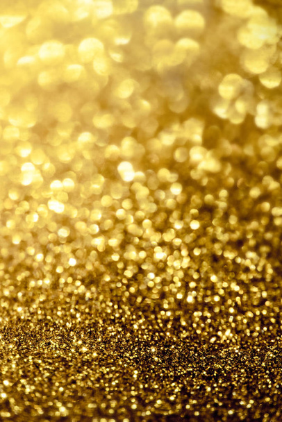 golden glitter bokeh lighting texture Blurred abstract backgroun - Photo, image