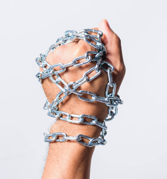 Chained fist hands with - Fotoğraf, Görsel