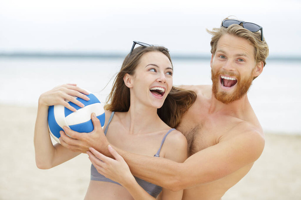 a couple in beach volleyball - Zdjęcie, obraz
