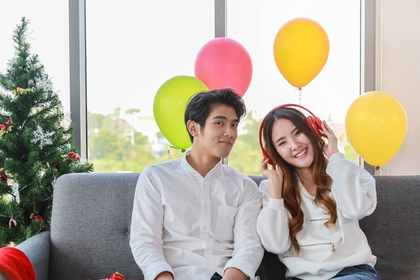 Happy New Year, Xmas and couple concept. Asian young man and wom - 写真・画像