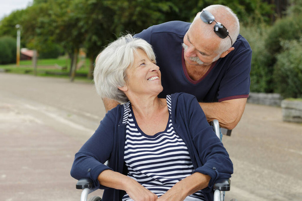 a senior couple in wheelchair - Φωτογραφία, εικόνα