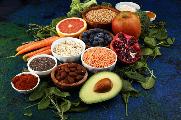 Здорове харчування чистий вибір їжі: фрукти, овочі, насіння, су
 - Фото, зображення