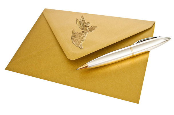 Złota koperta z długopisem - Zdjęcie, obraz