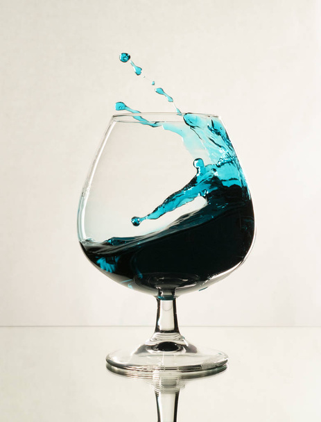 Splash of water in a wine glass - 写真・画像