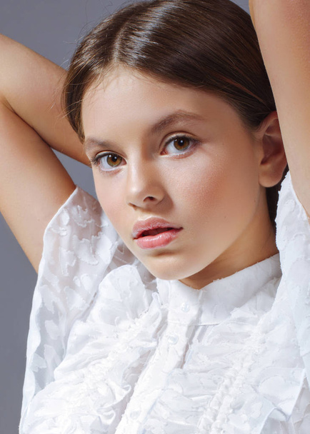 portrait of young model girl in studio - Foto, Imagen