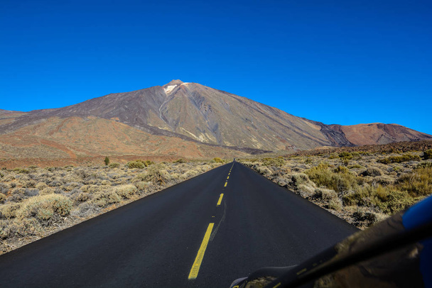 Beautiful Country roads and nature. Teide in the middle of the road. - Photo, Image
