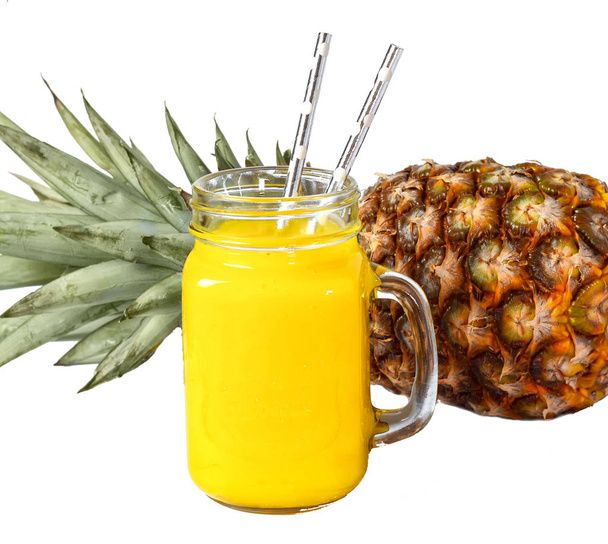 Pineapple juice in a glass with a straw isolated on a white background. - Fotoğraf, Görsel