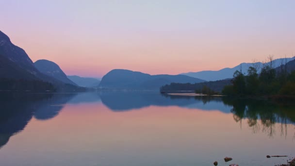 Picturesque view of the Bohinj Lake after sunset, Slovenia. - Кадри, відео
