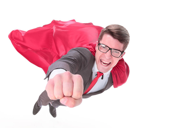 confident superhero businessman is flying to you - Фото, изображение