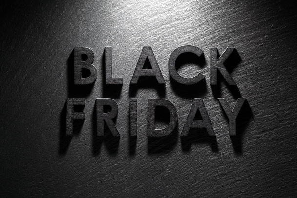 Black Friday text on black slate background - Photo, Image