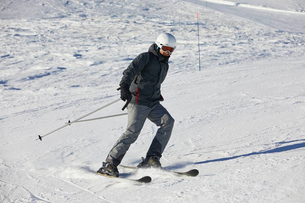 Skiing in the winter snowy slopes - Fotó, kép