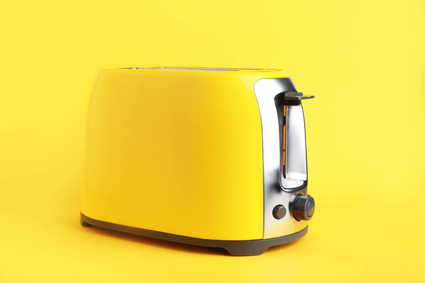 Modern toaster on color background - Photo, Image