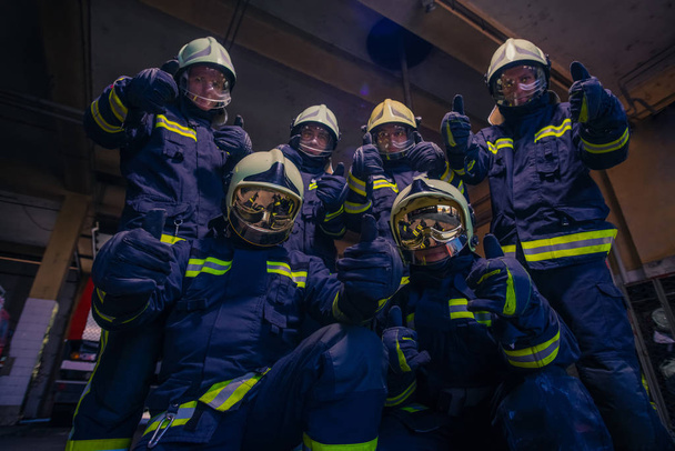 Portrait of group of firefighters wearing protective uniform ins - Photo, Image