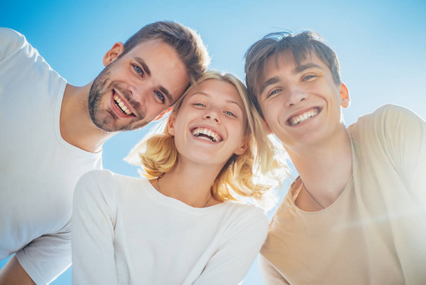 Happy group young people. Cheerful smiling happy best friends walking outdoor together and having great time. Sweet memories about summer holidays. Leisure activity and friendship concept. - Фото, изображение
