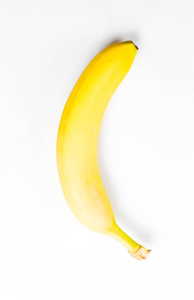 Fresh and tasty yellow bananas for a healthy diet on a white background - 写真・画像