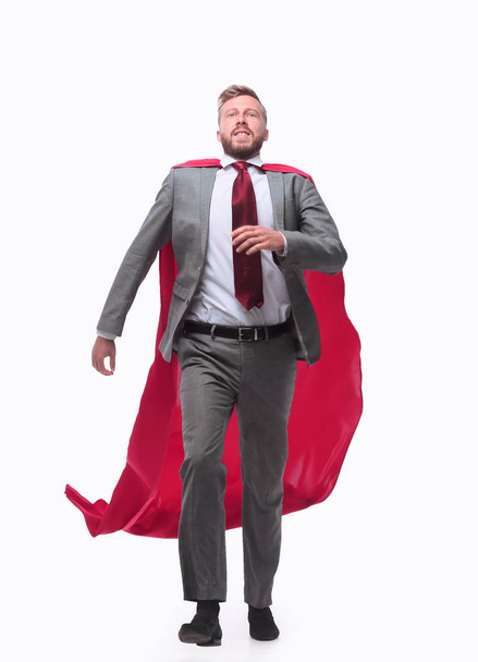 businessman in a superhero raincoat striding confidently forward. - Φωτογραφία, εικόνα
