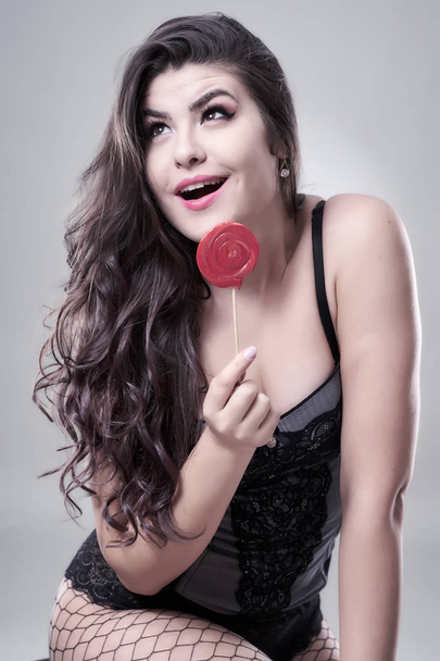 Studio shot of a beautiful latino model on gray background - Foto, immagini