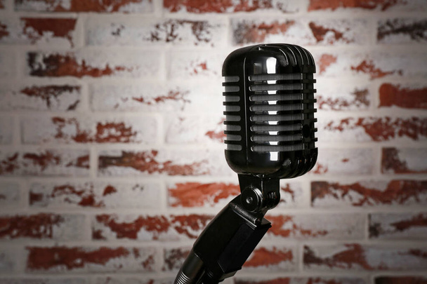Retro microphone on brick  background - Foto, Imagem