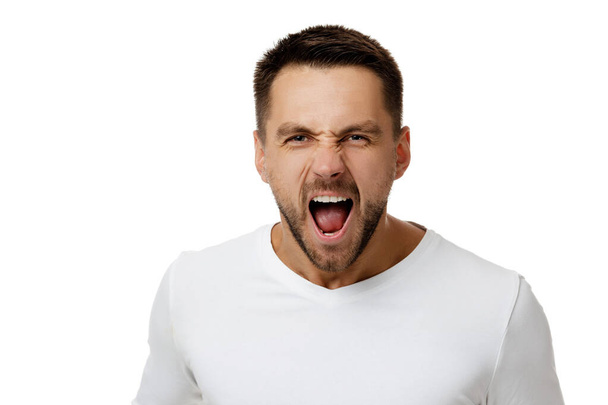 man in casual white shirt shouting - Fotografie, Obrázek