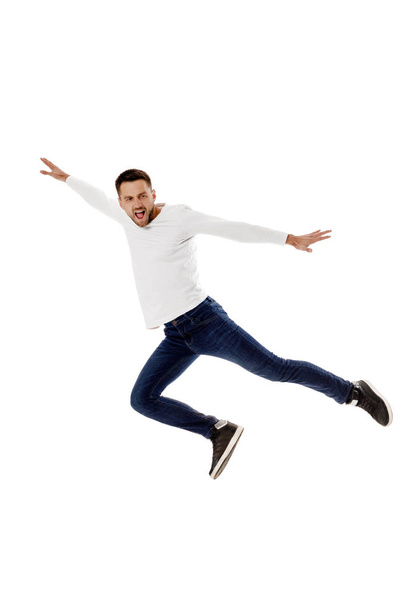 handsome young bearded man jumping - Foto, immagini