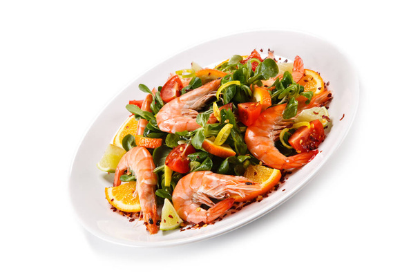 Seafood salad with shrimps on white plate - Fotoğraf, Görsel
