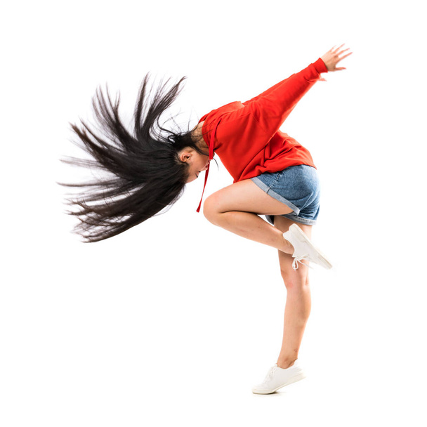 Joven bailarina asiática sobre aislado blanco fondo
 - Foto, imagen