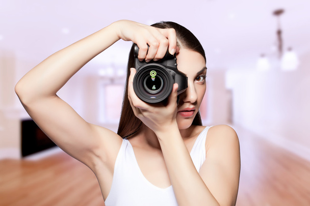 beautiful girl taking a photograph - Photo, Image