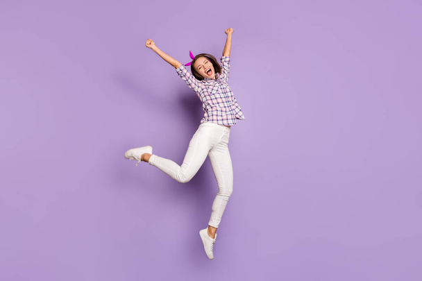 Full length body size view of her she nice attractive lovely cheerful cheery girl jumping having fun time celebrating cool accomplishment isolated over violet purple lilac pastel color background - Foto, Bild