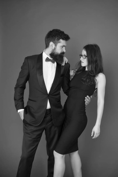 Formal party. Couple in love on date. art experts of bearded man and woman. esthete. Romantic relationship. Formal sexy couple. formal fashion for couple. romantic couple in formal tuxedo and dress - 写真・画像