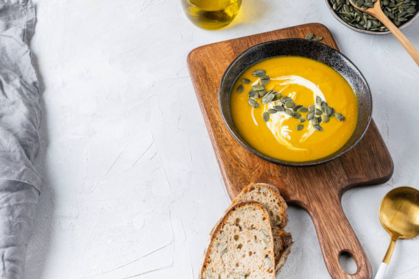 Pumpkin squash soup with seeds, olive oil - Photo, Image
