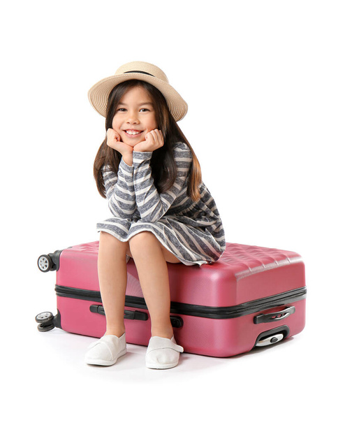 Cute girl with suitcase on white background - Foto, Imagem