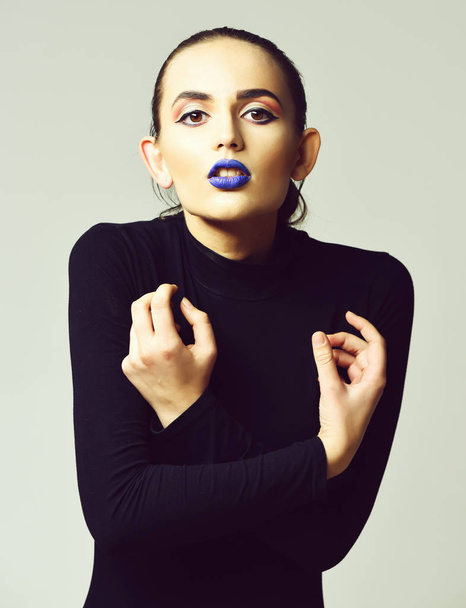 Pretty girl with adorable face and blue lips - Foto, Imagen