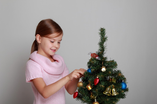 Girl near Christmas tree - Fotografie, Obrázek