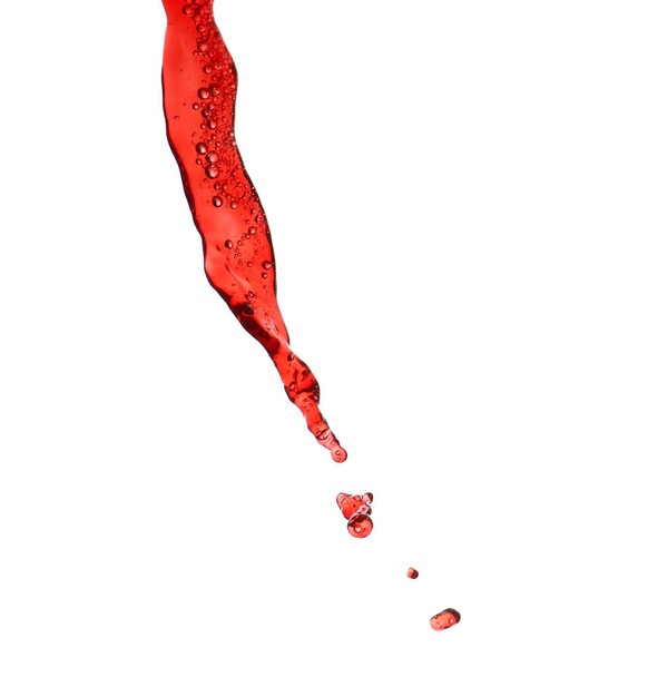 Roiskeita punaviiniä valkoisella taustalla
 - Valokuva, kuva