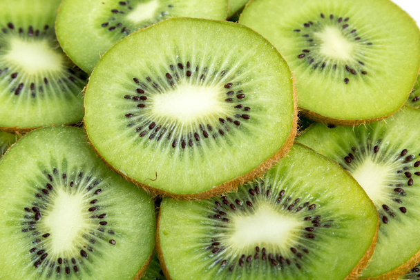 background of kiwi fruit chopped into slices - Foto, Imagem